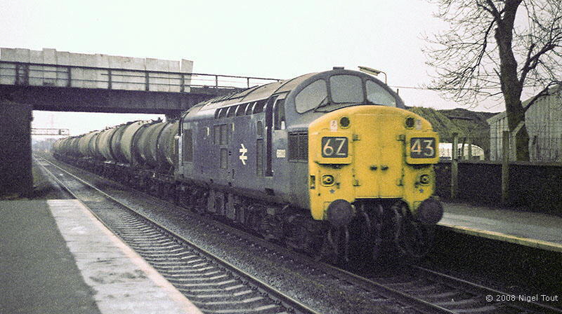 Train under bridge