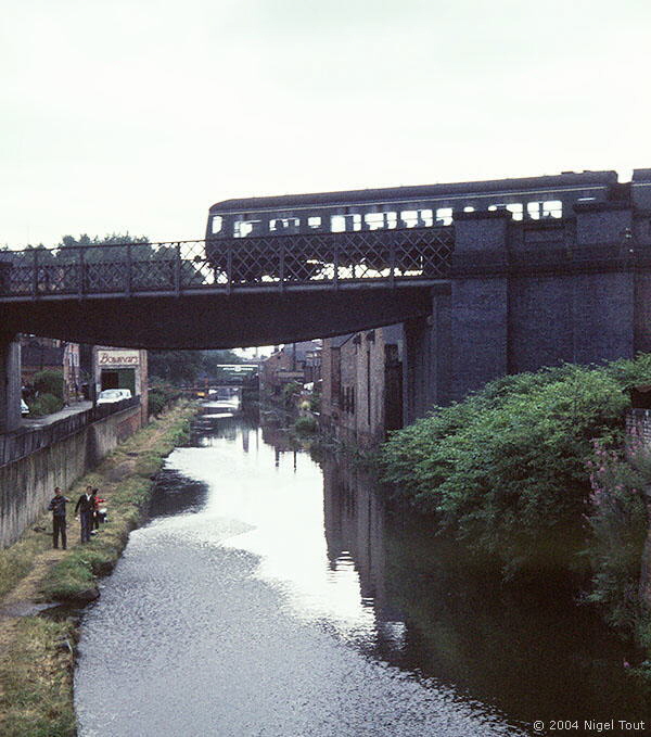 Passenger train to Nottingham, crossing the canal just north of Leicester Central station